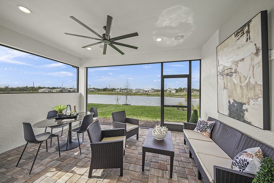 Representative exterior details of a home built from the Regatta by Homes by Towne in Shellstone at Waterside, Sarasota (Image 3).