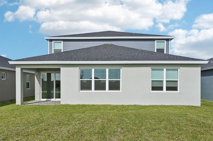 Exterior details and patio area of a home in Brystol at Wylder - Reserve Series, Port St. Lucie (Image 20).