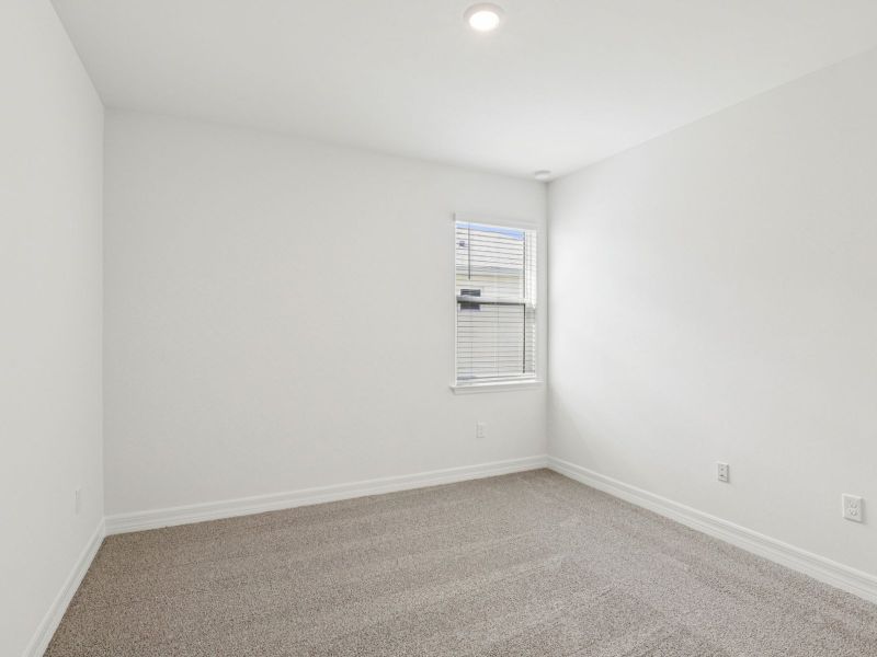 Spacious, unfurnished interior of a new home in Crescent Lakes - Signature Series, Punta Gorda (Image 19).