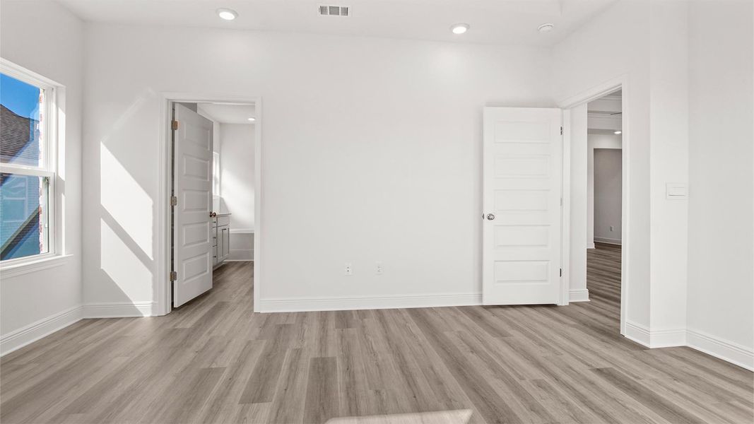 Representative unfurnished interior of a home built from the Madison by D.R. Horton in Owl's Head Farms, Freeport (Image 30).