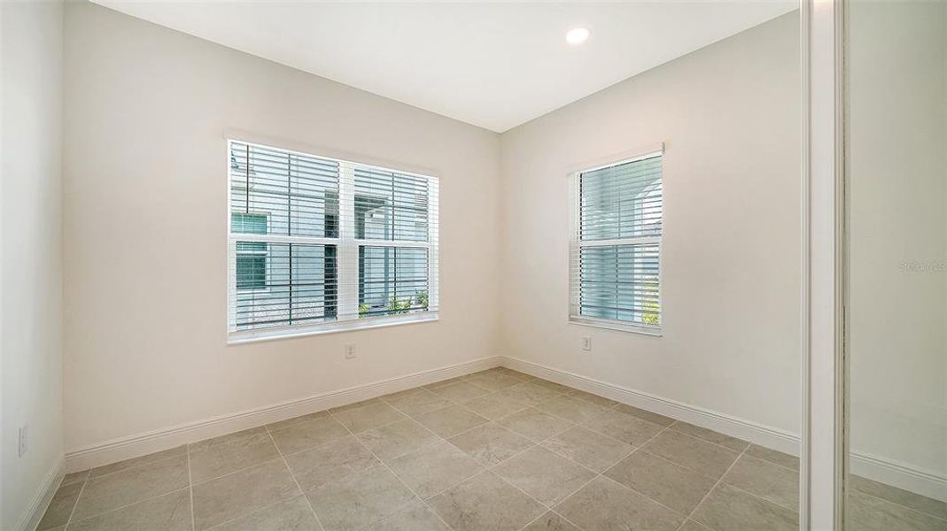 Spacious, unfurnished interior of a new home in Windward Real Estate and Homes for Sale in Sarasota, FL - Neal Communities, Lakewood Ranch (Image 36).