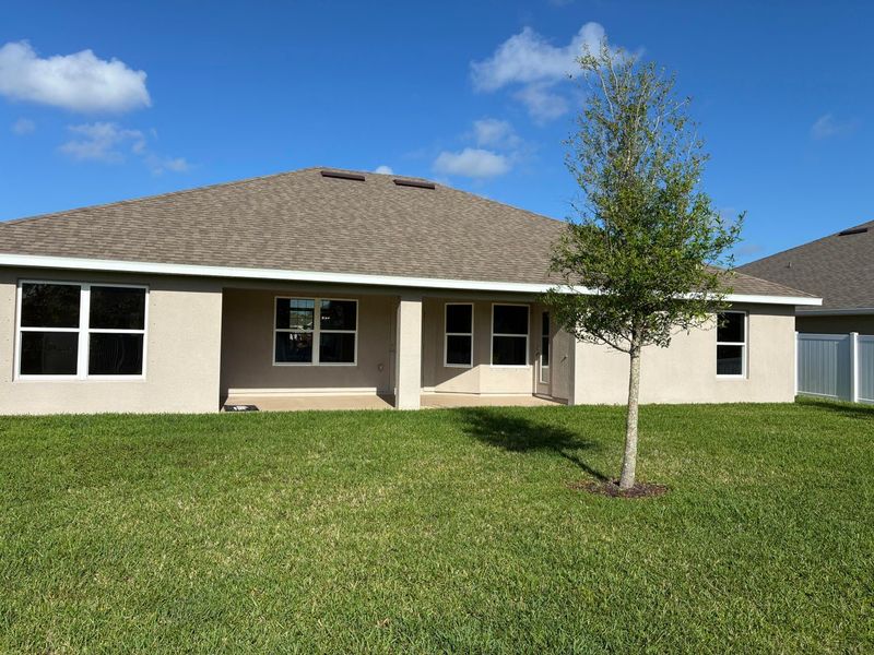 Exterior details and patio area of a home in Waterstone 72, Fort Pierce (Image 3).