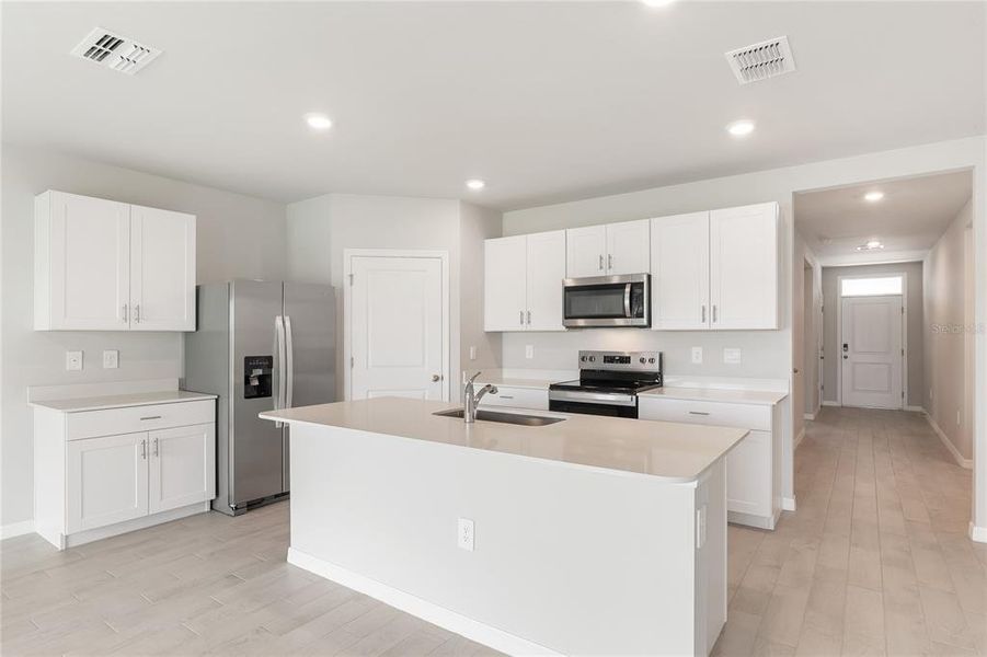 Furnished interior view inside a new home in Burnt Store Village, Punta Gorda (Image 6). Furnished interior view inside a new home in Burnt Store Village, Punta Gorda (Image 6).