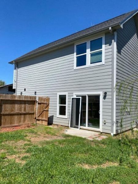 Exterior details and patio area of a home in , Houston (Image 11).
