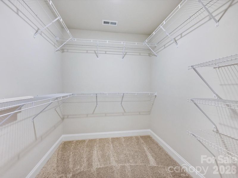 Spacious, unfurnished interior of a new home in North Creek Village, Huntersville (Image 23).