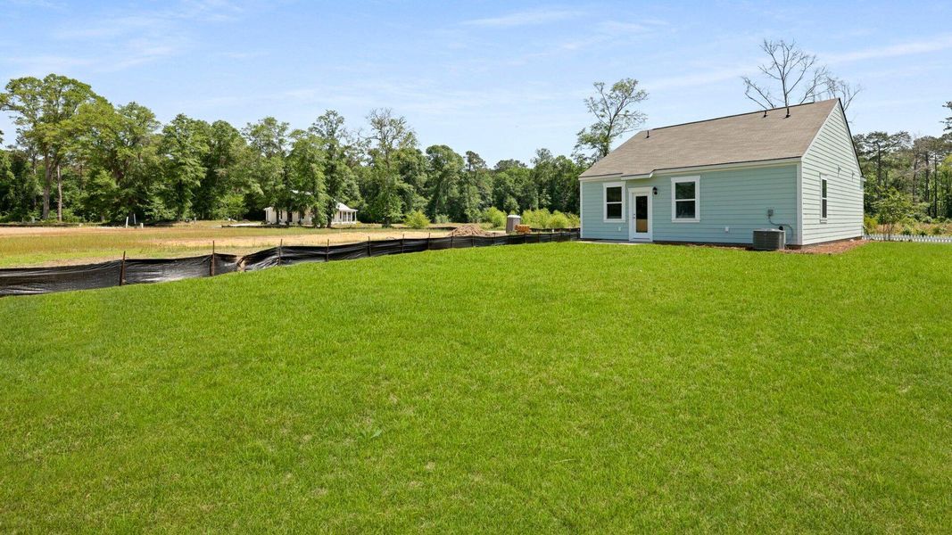 Front exterior of a new home in North Shore, Summerton, SC, highlighting curb appeal (Image 16).