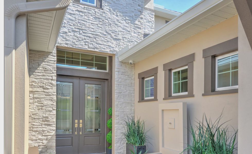 Exterior details and patio area of a home in The Conservatory at Hammock Beach, Palm Coast (Image 22).