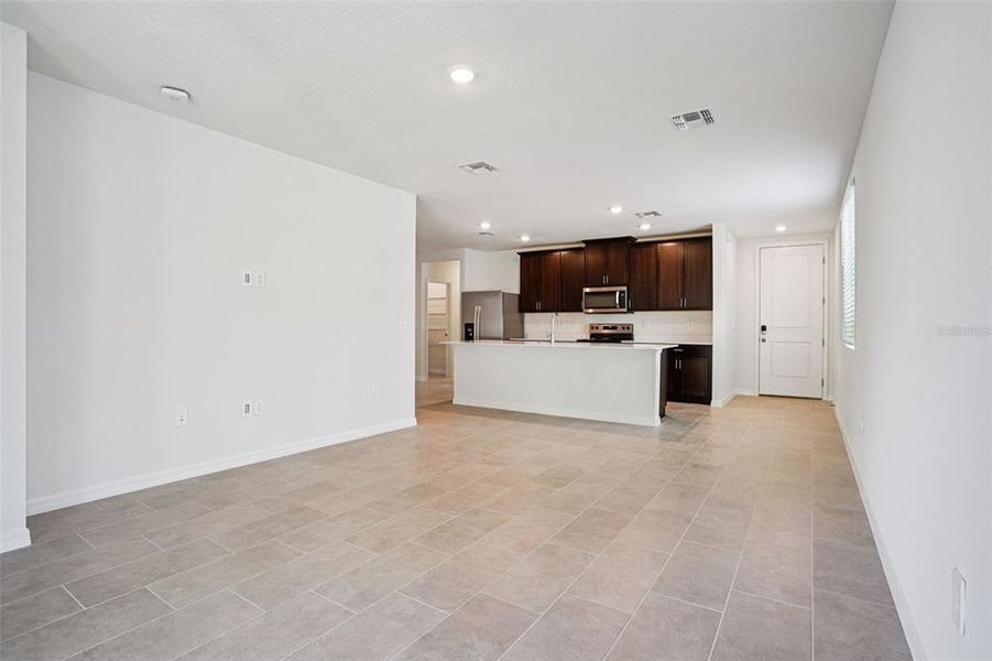 Spacious, unfurnished interior of a new home in Ridgehaven - Villas, Ormond Beach (Image 39).