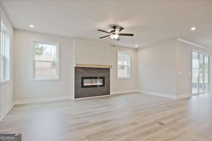 Spacious, unfurnished interior of a new home in The Paddocks at Doc Hughes, Buford (Image 38).