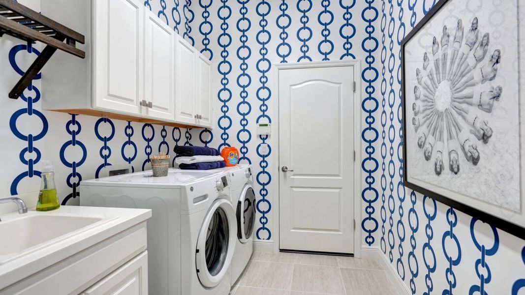 Representative furnished interior of a home built from the Sanibel 2 by Neal Communities in SkySail, Naples (Image 9).
