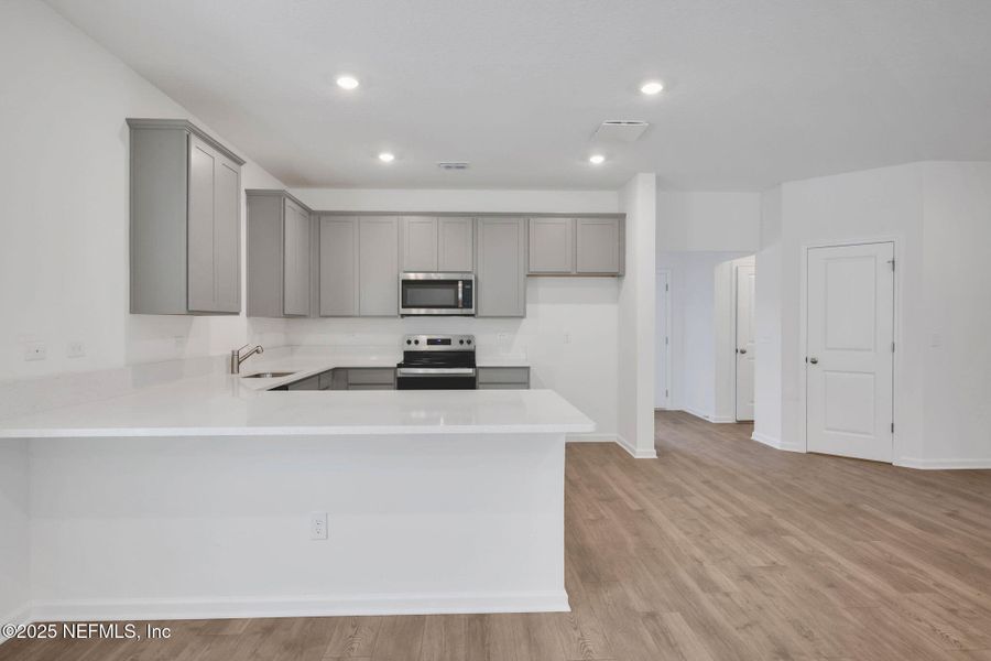 Furnished interior view inside a new home in Bellbrooke, Jacksonville (Image 7).