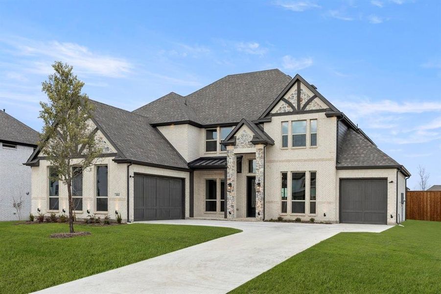 Front exterior of a new home in Cambridge Estates, Prosper, TX, highlighting curb appeal (Image 2). Front exterior of a new home in Cambridge Estates, Prosper, TX, highlighting curb appeal (Image 2).