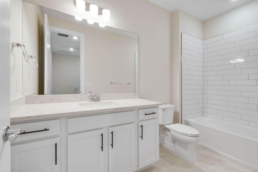 Furnished interior view inside a new home in Camellia, Stuart (Image 12).