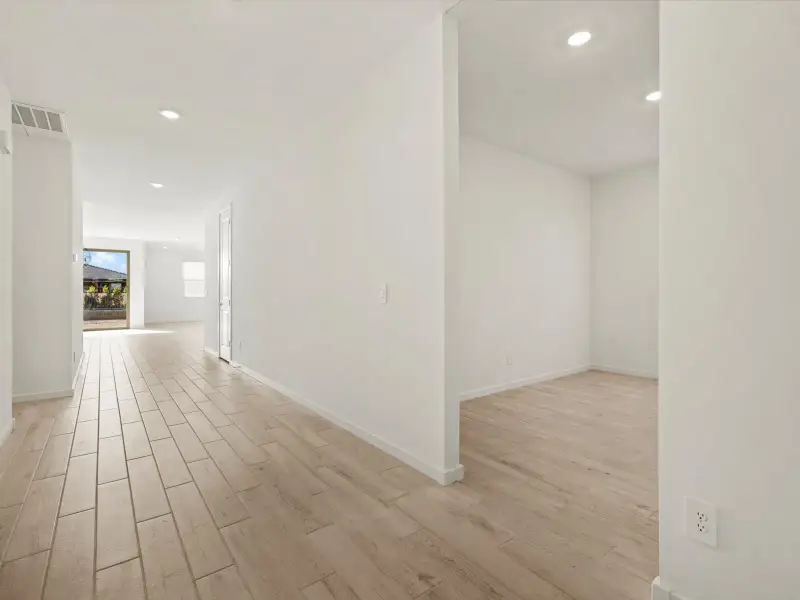 Spacious, unfurnished interior of a new home in Entrada Reserve Series, Tolleson (Image 11).