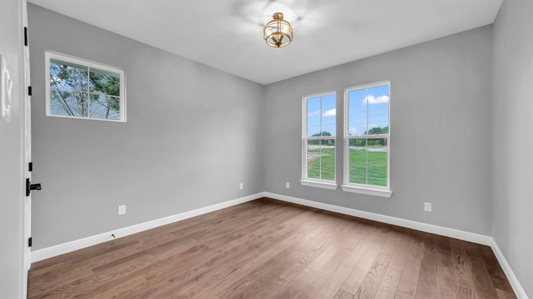 Spacious, unfurnished interior of a new home in Oak Water Ranch, Granbury (Image 26).