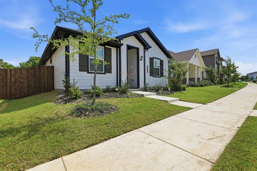 Front exterior of a new home in The Overlook, Fort Worth, TX, highlighting curb appeal (Image 24).