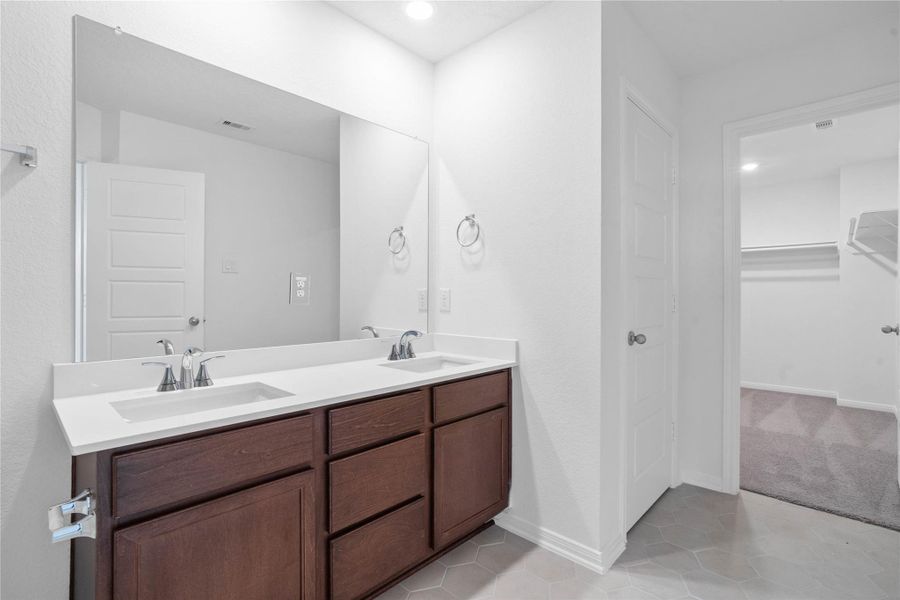 Additional view of primary bathroom - entrance to the walk-in closet! Additional view of primary bathroom - entrance to the walk-in closet!
