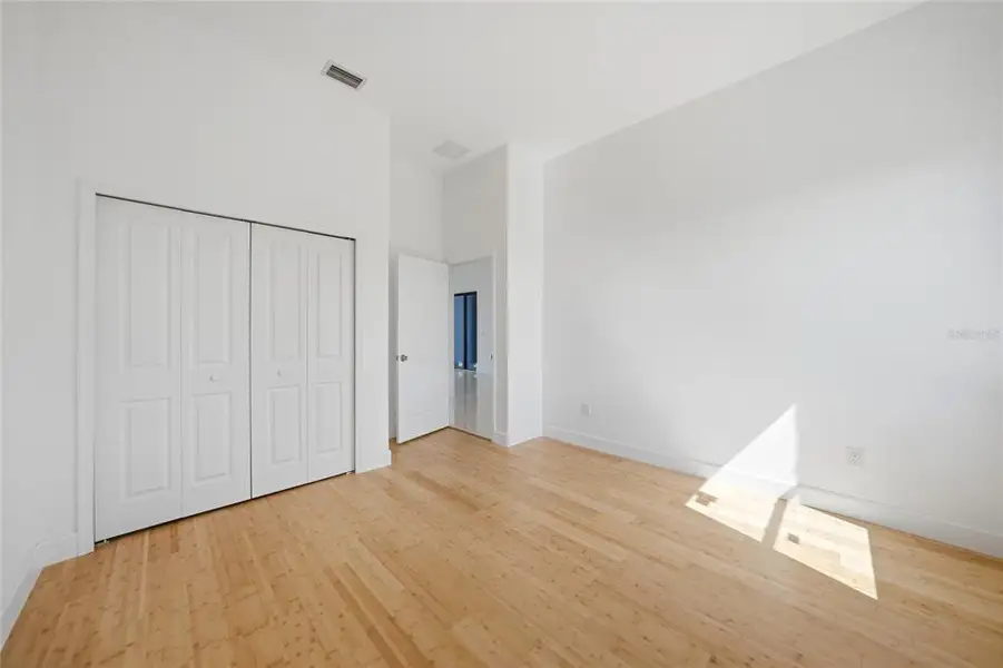 Spacious, unfurnished interior of a new home in , Port Charlotte (Image 40).