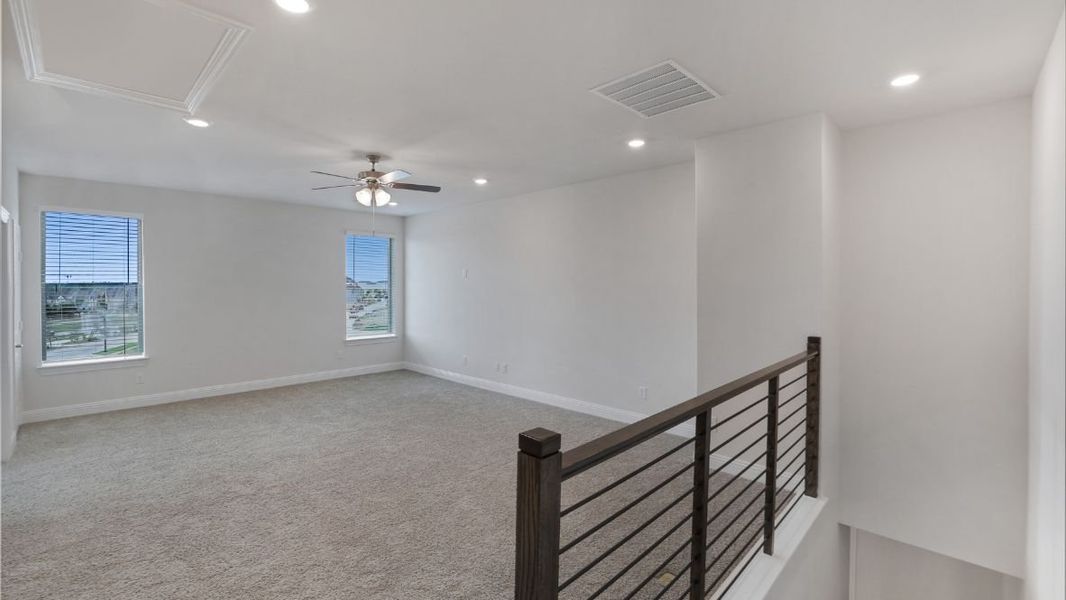 Representative unfurnished interior of a home built from the Appaloosa by D.R. Horton in The Avenue, Allen (Image 26).