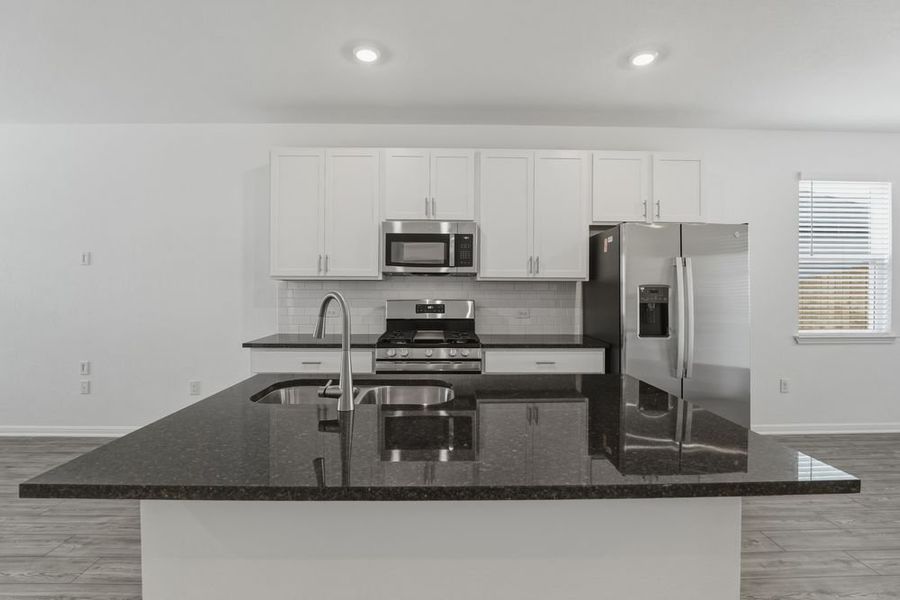 Furnished interior view inside a new home in Longview, Del Valle (Image 4).