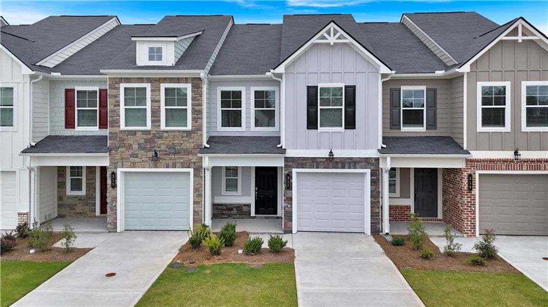 Front exterior of a new home in Village Green, Adairsville, GA, highlighting curb appeal (Image 2).