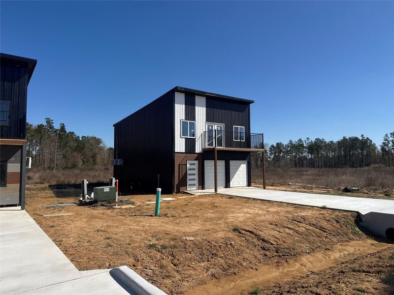 Front exterior of a new home in , Cleveland, TX, highlighting curb appeal (Image 2). Front exterior of a new home in , Cleveland, TX, highlighting curb appeal (Image 2).