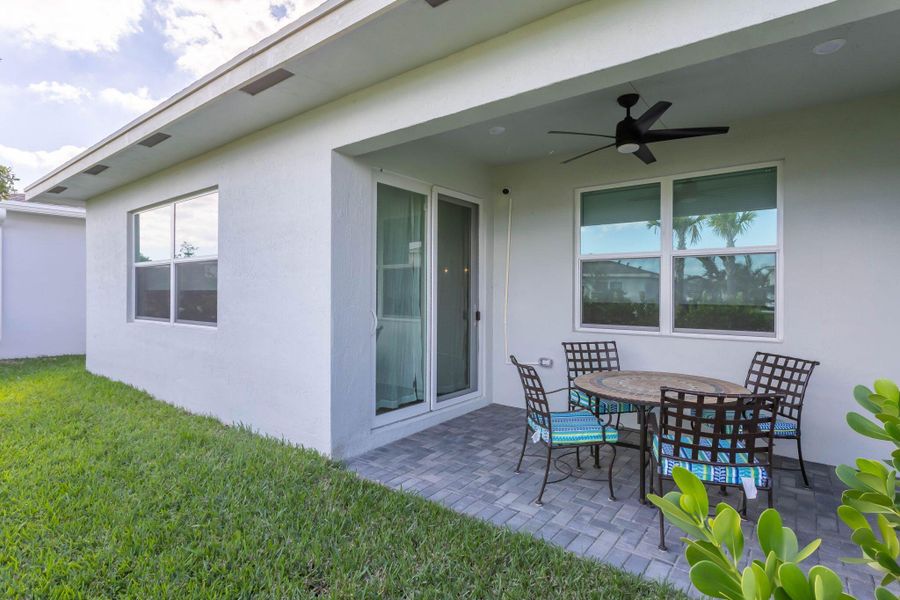 Exterior details and patio area of a home in Delray Trails: The Woods, Delray Beach (Image 4).