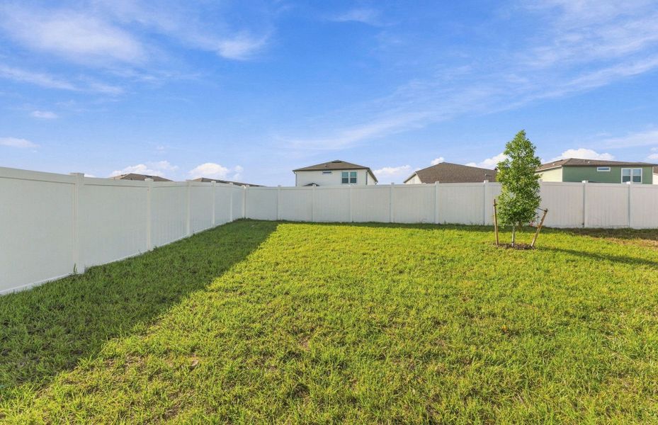 Exterior details and patio area of a home in Caldera, Spring Hill (Image 3).