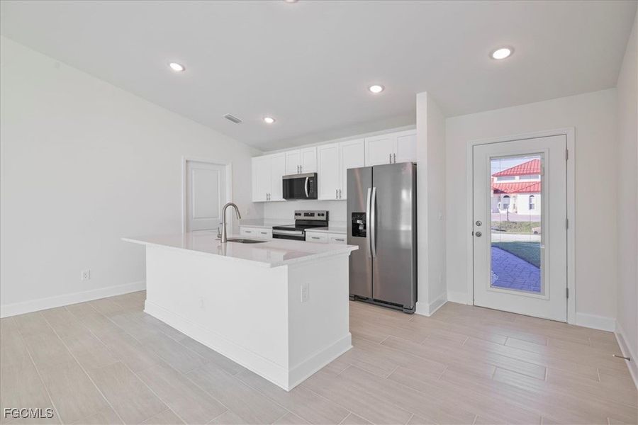 Furnished interior view inside a new home in Cape Coral, Cape Coral (Image 6). Furnished interior view inside a new home in Cape Coral, Cape Coral (Image 6).