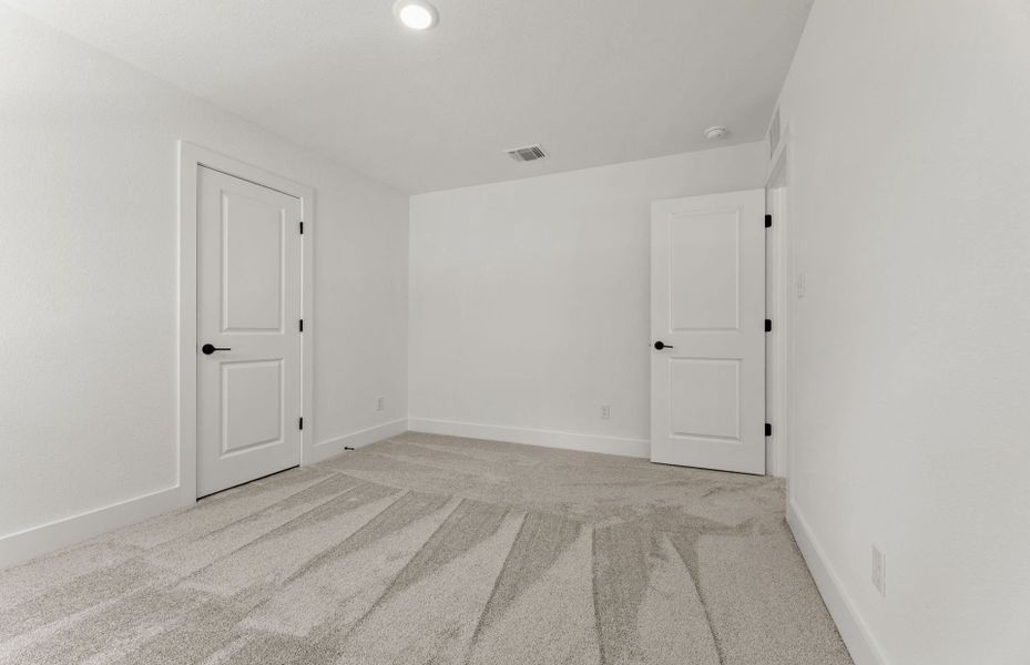 Spacious, unfurnished interior of a new home in Saddleback at Santa Rita Ranch, Liberty Hill (Image 19). Spacious, unfurnished interior of a new home in Saddleback at Santa Rita Ranch, Liberty Hill (Image 19).