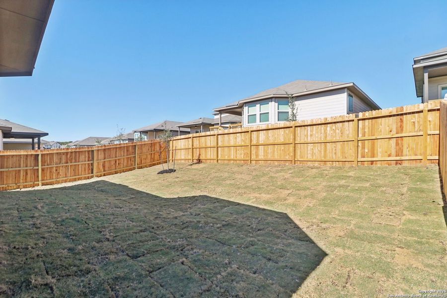 Exterior details and patio area of a home in Lark Canyon, New Braunfels (Image 19).
