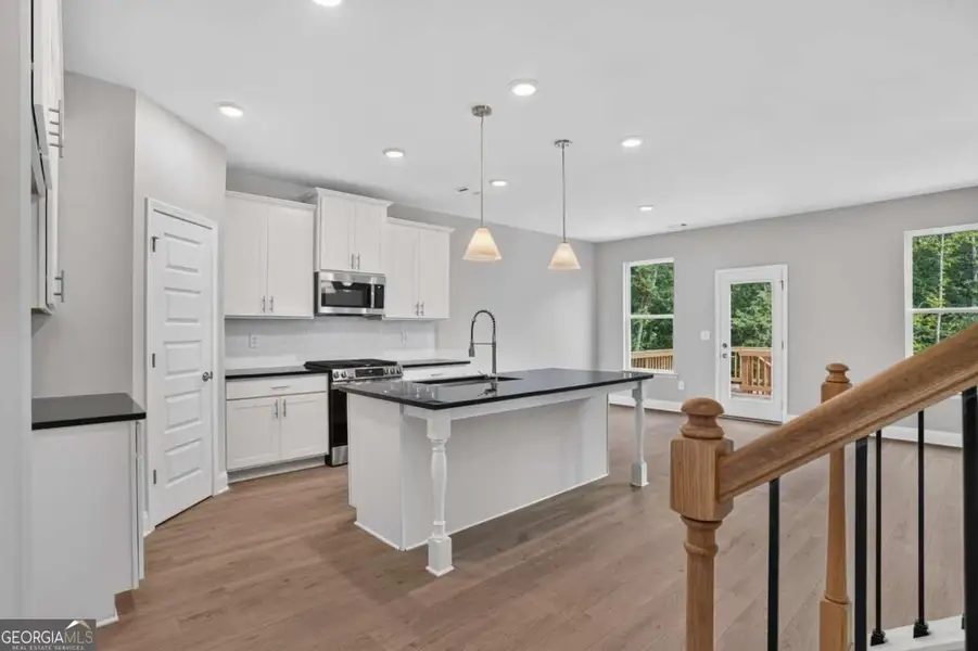 Furnished interior view inside a new home in Austin Ridge, Commerce (Image 7).
