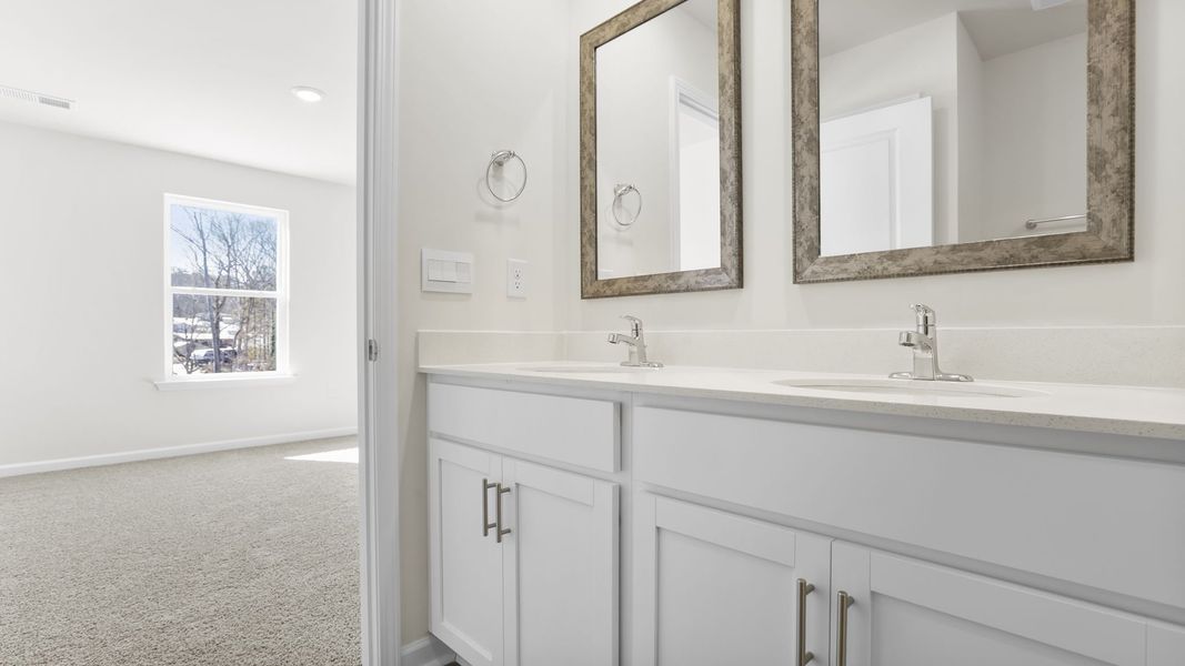 Furnished interior view inside a new home in Village Grove, Greenville (Image 12).
