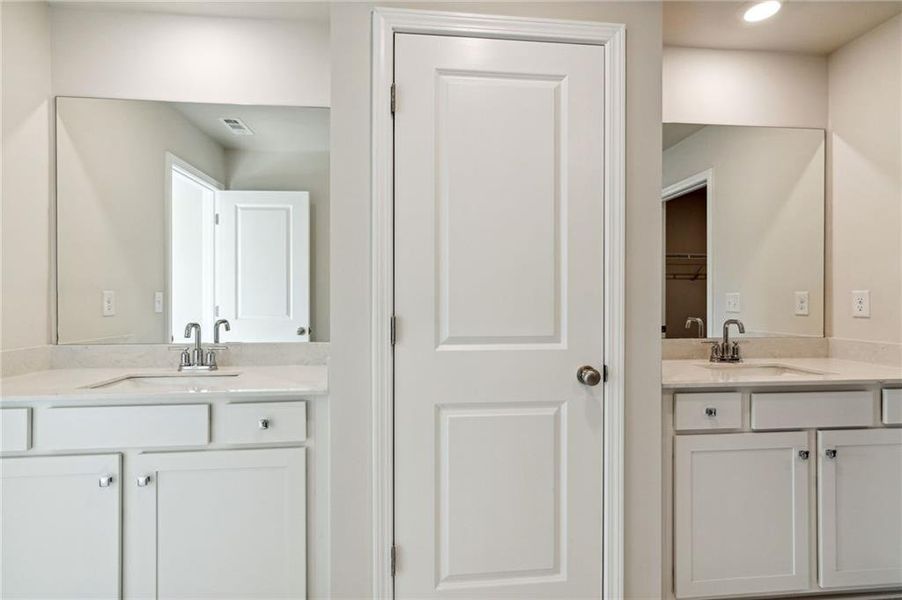 Furnished interior in a model home at City Square East in Hoschton (Image 11).