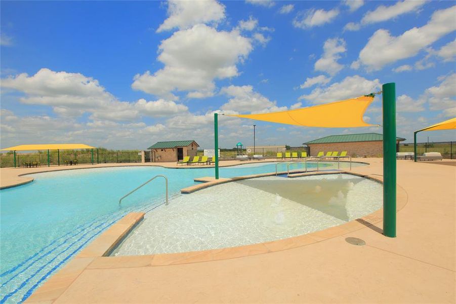 View of swimming pool with a patio area