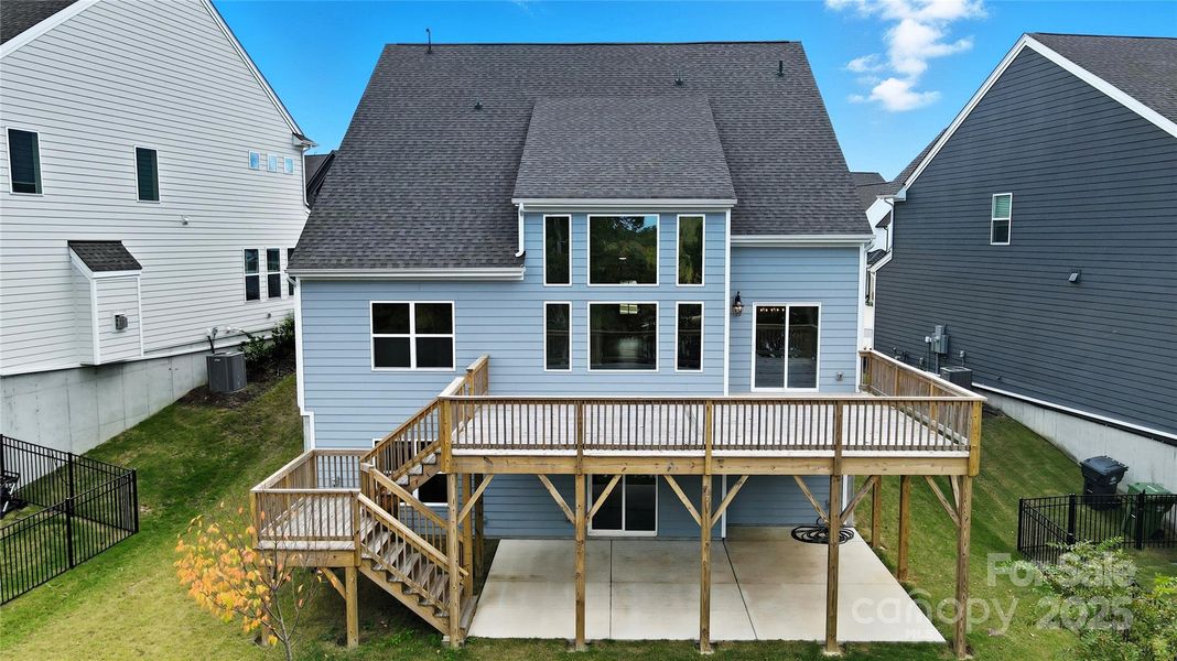 This gorgeous home is perfectly positioned to maximize outdoor enjoyment, featuring a fabulous deck, a covered patio, and a private floating dock—ideal spots for outdoor entertaining or simply soaking in the serene lake scenery This gorgeous home is perfectly positioned to maximize outdoor enjoyment, featuring a fabulous deck, a covered patio, and a private floating dock—ideal spots for outdoor entertaining or simply soaking in the serene lake scenery