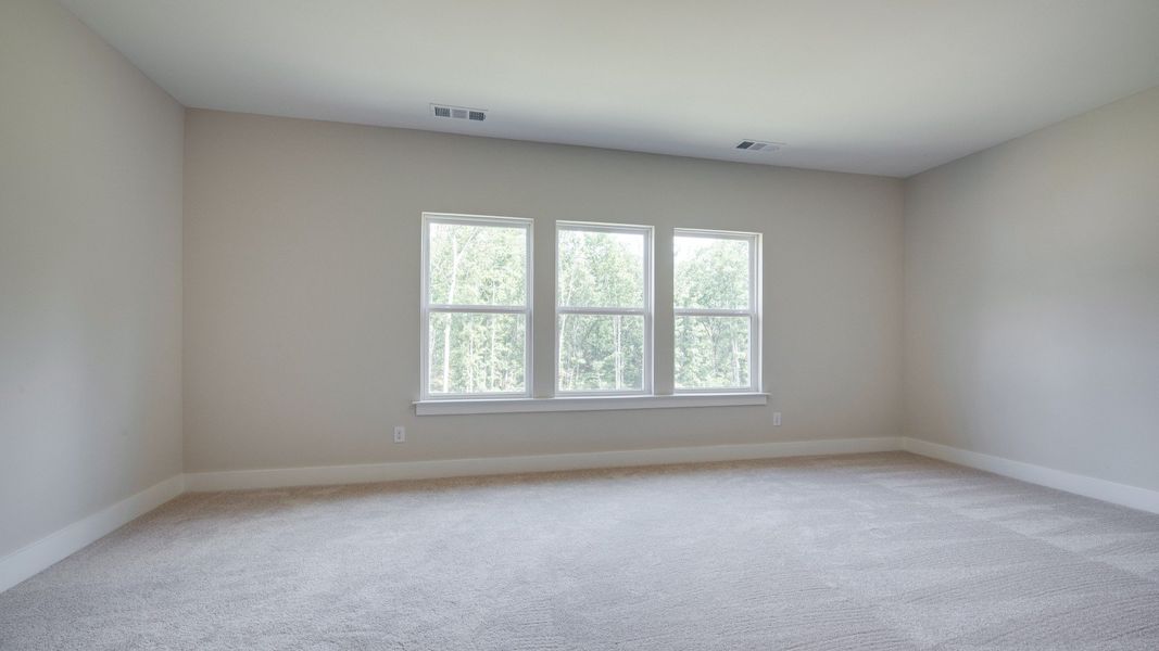 Versatile spacious upstairs bedroom with three windows