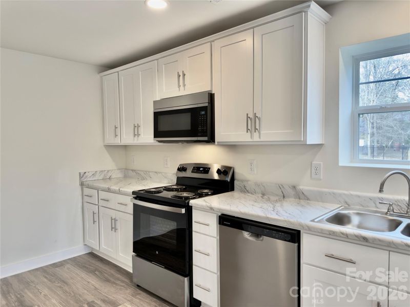 Furnished interior view inside a new home in , Oakboro (Image 6).