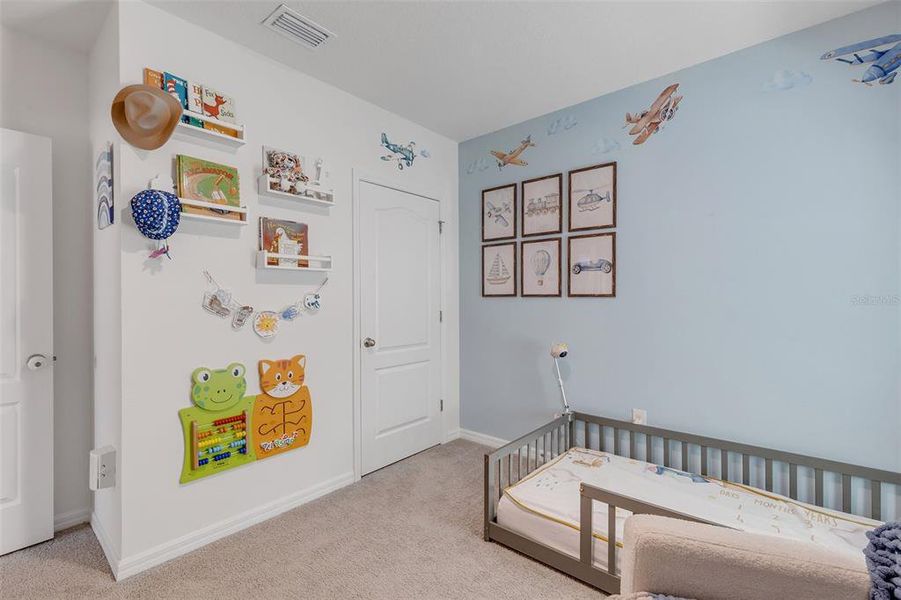 Furnished interior view inside a new home in Groveside at Ormond Station, Ormond Beach (Image 39).