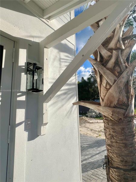 Exterior details and patio area of a home in , Stuart (Image 33).