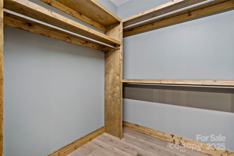 Primary walk in closet Primary walk in closet