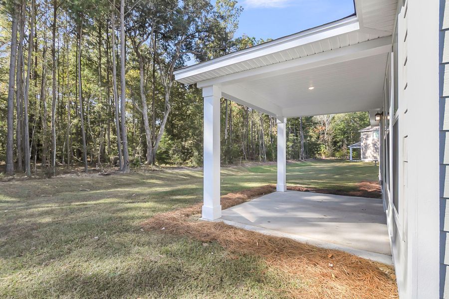 Exterior details and patio area of a home in High Point at Foxbank, Moncks Corner (Image 3). Exterior details and patio area of a home in High Point at Foxbank, Moncks Corner (Image 3).