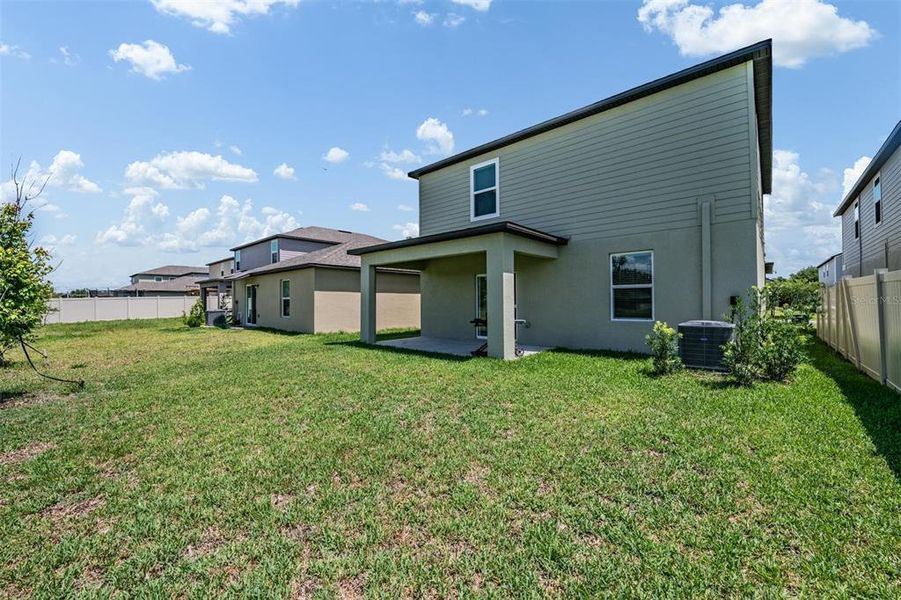 Exterior details and patio area of a home in Park East, Plant City (Image 4).