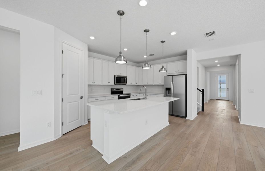 Furnished interior view inside a new home in Fiddler's Cove, Kingsland (Image 6).