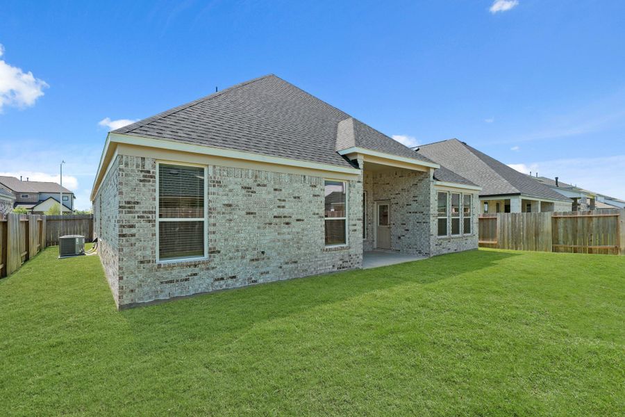 Front exterior of a new home in Briarwood Crossing, Rosenberg, TX, highlighting curb appeal (Image 2).