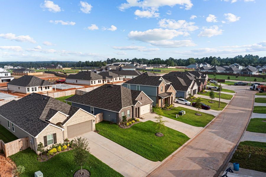 Front exterior of a new home in Lone Star Landing, Montgomery, TX, highlighting curb appeal (Image 17). Front exterior of a new home in Lone Star Landing, Montgomery, TX, highlighting curb appeal (Image 17).