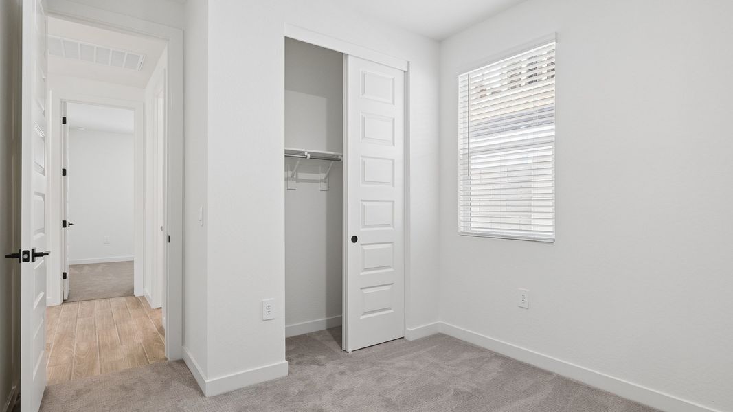 Spacious, unfurnished interior of a new home in The Ridge at Stone Butte, Phoenix (Image 16).