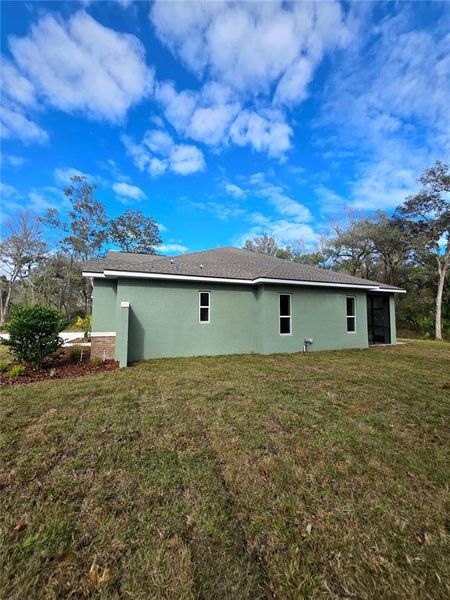 Exterior details and patio area of a home in , Brooksville (Image 29).