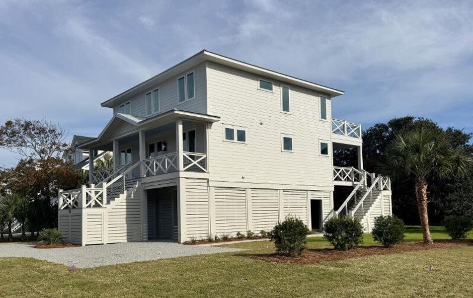 Front exterior of a new home in , Edisto Beach, SC, highlighting curb appeal (Image 30).