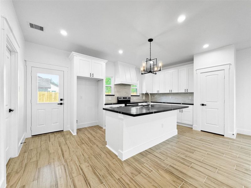 Kitchen with Quartz Countertops and soft closing cabinets Kitchen with Quartz Countertops and soft closing cabinets